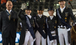 The German dressage team arrives at the price giving ceremony for the team dressage compet...