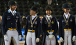 The Swedish dressage team arrives at the price giving ceremony for the team dressage compe...