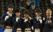 The Swedish dressage team arrives at the price giving ceremony for the team dressage compe...
