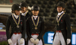 The Danish dressage team arrives at the price giving ceremony for the team dressage compet...
