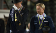 German rider Sönke Rotheberger and Swedish rider Patrik Kittel congratulate each other at...