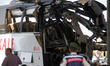 The remains of a bus is seen at an accident site in Ankara, Turkey, Aug. 24, 2017. At leas...