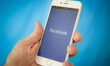 The Facebook logo is seen on an Apple iPhone in this photo illsutration on 28 August, 2017...