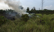 Firefighters trying to extinguish a land and forest fire on Augustus 30, 2017 in Pekanbaru...