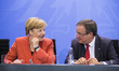 German Chancellor Angela Merkel and Prime Minister of North-Rhine Westphalia Armin Laschet...