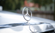 Mercedes logos are seen on the front of an older Mercedes-Benz car on 2 September, 2017. 