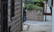 A narrow traditional street is pictured in the historic Hamamonu district of Ankara, Turke...