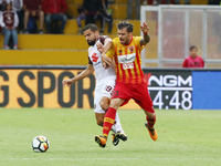 Lorenzo Venuti (R) of Benevento competes for the ball with Rincon Tomàs (L) of Turin FC during the Serie A match between Benevento Calcio an...