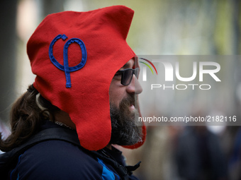 A man wears a phrygian cap symbolizing the movement of JL Mélenchon, France Unbowed. More than 10000 protesters took to the streets of Toulo...