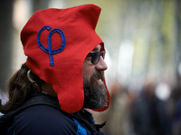 A man wears a phrygian cap symbolizing the movement of JL Mélenchon, France Unbowed. More than 10000 protesters took to the streets of Toulo...