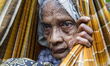 105 years old Halima along with her 13 members’ family arrived in Shahporir Dip, Tiknaf, B...
