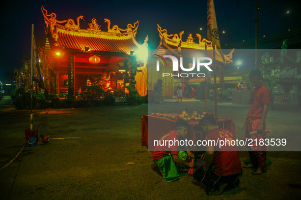 Member of chinese make a last preparation before start a specials prayer during the hungry ghost festivals in Teluk Pulai Klang, Malaysia on...