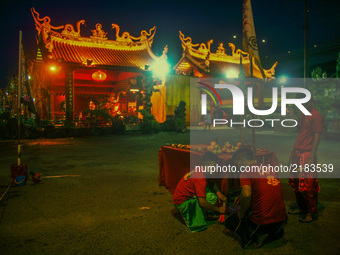 Member of chinese make a last preparation before start a specials prayer during the hungry ghost festivals in Teluk Pulai Klang, Malaysia on...