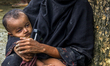 A Rohingya Muslim refugee woman with her child in Kutupalong, Bangladesh, on September 9,...