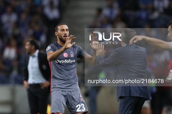 Besiktas' forward Cenk Tosun celebrates after scoring a goal with Besiktas' head coach Senol Gunes during the FC Porto v Besiktas - UEFA Cha...