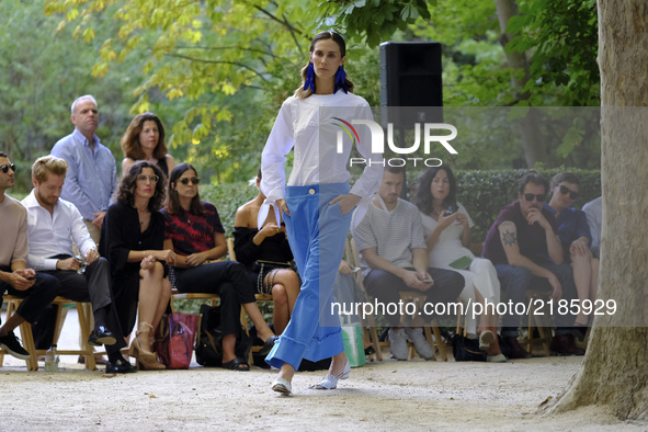  A model walks the runway at the Moises Nieto show during the Mercedes-Benz Fashion Week Madrid Spring/Summer 2018 on September 13, 2017 in...