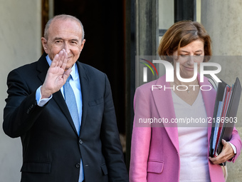 French Interior Minister Gerard Collomb (L) and French Defence Minister Florence Parly leave the Elysee presidential Palace after a cabinet...