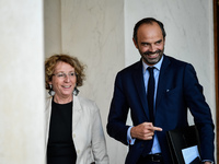 French Minister of Labour Muriel Penicaud and Prime Minister Edouard Philippe leave the Elysee presidential Palace after a cabinet meeting o...
