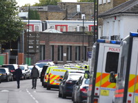 Police and emergency workers are seen on the site of a terror attack on an Underground train at Parsons Green station, London on September 1...