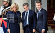 French President Emmanuel Macron and his wife Brigitte welcome former French President Nic...