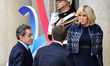 French President Emmanuel Macron and his wife Brigitte welcome former French President Nic...