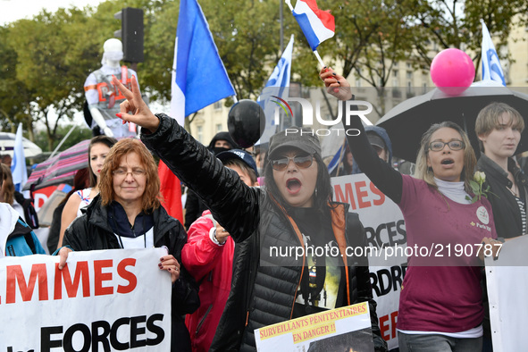 People attend a protest march demanding better means for French police officers on September 16, 2017, in Paris, one year after an increased...