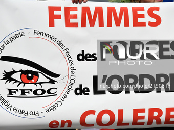 The FFOC, Femmes des Forces de l'Ordre en Colere, banner during a protest against the bad treatment and work conditions in France in Paris,...