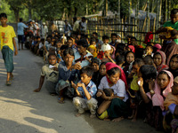 Refugee people wait for relief at palong khali, Cox’s Bazar, Bangladesh September 16, 2017. Around 370,000 Rohingya refugees have fled into...