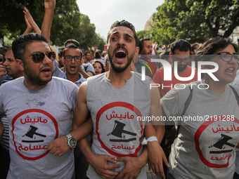 Protesters shout slogans during a march held under the slogan ‘firmness against the mafia regime’ by the movement "I don't forgive" (Manich...