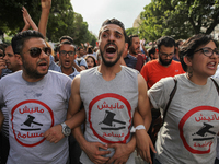 Protesters shout slogans during a march held under the slogan ‘firmness against the mafia regime’ by the movement "I don't forgive" (Manich...