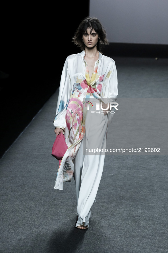 Model walks the runway at the Marcos Luengo show during the Mercedes-Benz Fashion Week Madrid Spring/Summer 2018 at Ifema on September 17, 2...