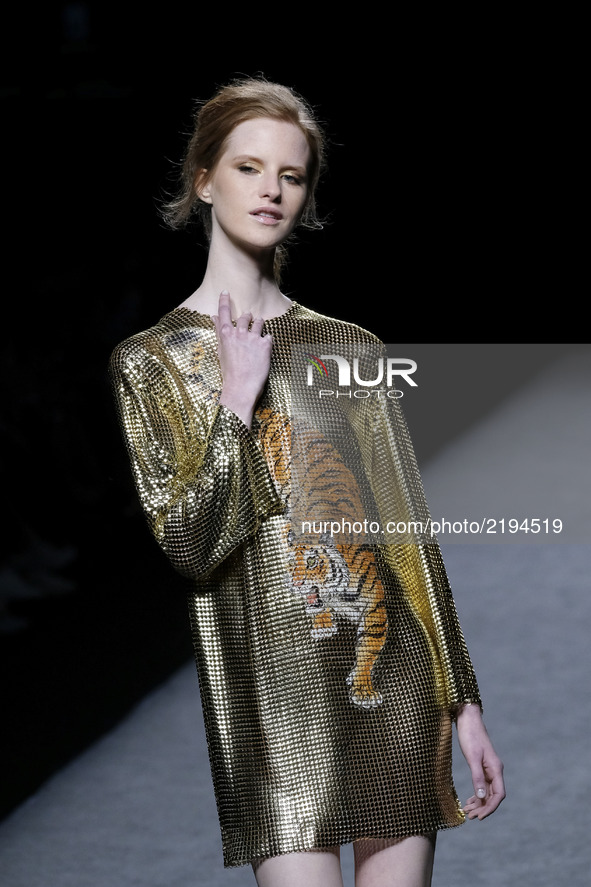 A model takes to the catwalk with a creation for Spring-Summer 2018 Collection of TERESA HELBIG during of the Madrid Fashion Week, in Madrid...