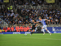 Asensio of Real Madrid duels for the ball with Zurutuza of Real Sociedad during the Spanish league football match between Real Sociedad and...