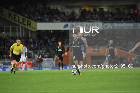 Isco of Real Madrid tries to controls the ball during the Spanish league football match between Real Sociedad and Real Madrid at the Anoeta...