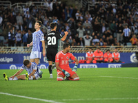 Asensio of Real Madrid celebrates with teammates after scoring during the Spanish league football match between Real Sociedad and Real Madri...