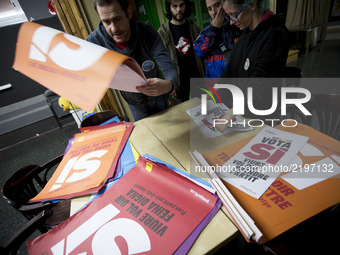 Members of the Popular Unity Candidature (CUP), distribute campaign posters in the popular district of Nou Barris, Barcelona, asking for the...