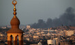 Smoke is seen following what witnesses said was an Israeli air strike in Gaza August 21, 2...
