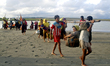 Rohingyas wait for boats at Shah Porir Dwip to go to the mainland in Cox's Bazar's Teknaf,...