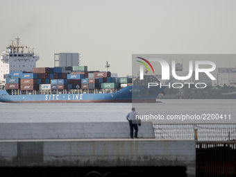 A container ship arrives at a port in Tokyo, September 19, 2017.  The Port of Tokyo is one of the largest Japanese seaports and one of the l...