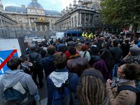 Demonstrators take part in a rally in front of  Paris courthouse on September 19, 2017  during the trial of nine people over an attack by de...