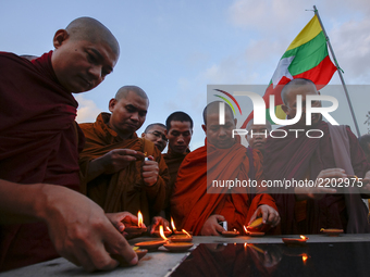 Monks from Myanmar  residing in Sri Lanka during a  peaceful demonstration to show solidarity with Buddhist community in Myanmar at Colombo,...