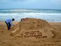 A sand art is seen on the Bay of Bengal Sea's eastern coast at Puri, India, on 21 September 2017 creating by sand artist Sudarshan Pattnaik...