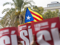 Thousands of pro-independence demonstrators from Catalonia demonstrate in Barcelona against the presence of the Spanish police and in favor...
