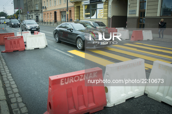 A Mercedes-Benz CLS is seen traversing a makeshift zebra crossing in one of the citys busiest roads on World Car-Free Day on September 22, 2...