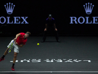 Team World player Jack Sock of United States serves against Team Europe player Rafael Nadal of Spain during the first day at Laver Cup on Se...