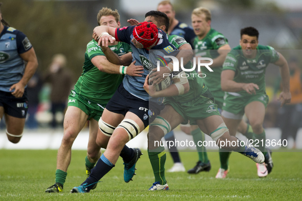 Seb Davies of Cardiff tackled by Jarrad Butler and Kieran Marmion of Connacht during the Guinness PRO14 Conference A match between Connacht...