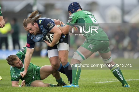 Kristian Dacey of Cardiff tackled by John Muldoon and Kieran Marmion of Connacht during the Guinness PRO14 Conference A match between Connac...