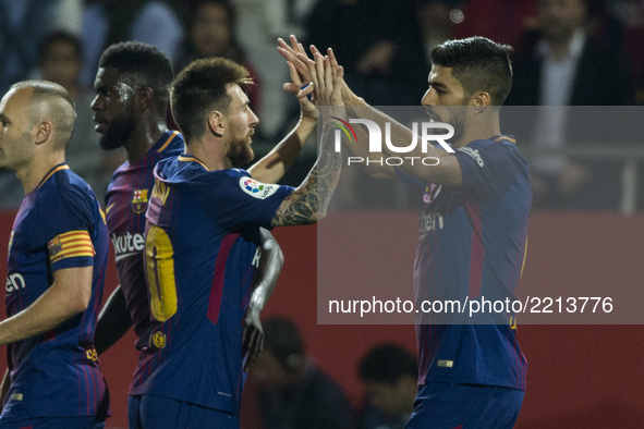 Luis Suarez from Uruguay of FC Barcelona celebrating his goal with Leo Messi from Argentina of FC Barcelona during the La Liga match between...