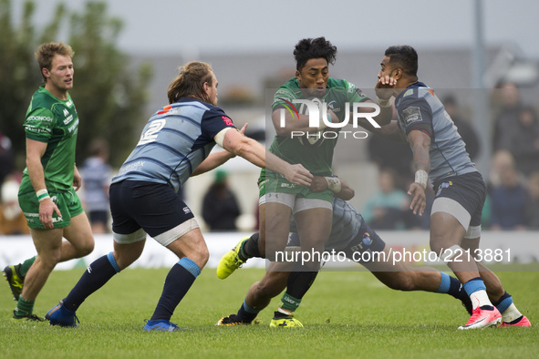Bundee Aki of Connacht tackled by Willis Halaholo and Kristian Dacey of Cardiff during the Guinness PRO14 Conference A match between Connach...