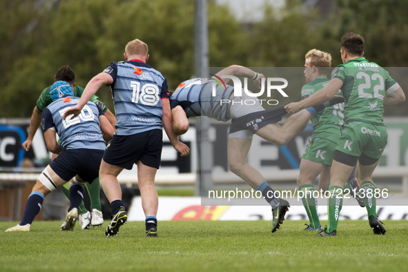 Alex Cuthbert of Cardiff tackled by Tom Farrell (22) of Connacht during the Guinness PRO14 Conference A match between Connacht Rugby and Car...
